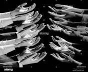 1960s multiple exposure montage male hands begging for a hand out aan1tr.jpg from exposed montage