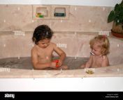two young girls in bath ahjr45.jpg from young and antuy bathing