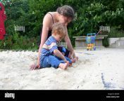 mother with her little boy in a sandpit germany ajc60n.jpg from young rajce ru