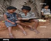an older brother reads a story to his blind sister outside their home a1d2k6.jpg from tamil village brother and sister fucking