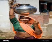 indian village woman carrying water on her head b50jaw.jpg from old navel aunty