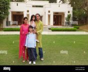 family in front of home bbbmnm.jpg from rich desi wife with house 3gp video