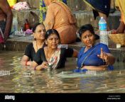 woman take morning bath inside of river ganges in varanasi india beb435.jpg from tamil aunty open bath