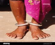 anklet worn by elderly indian woman close up bxthwc.jpg from indian aunty anklet feet wors