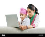 mother with her son looking at a laptop c6y3yr.jpg from mom son punjabi