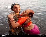 two women bathing in ganges river india cf230k.jpg from anty river bathin