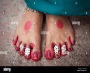 indian woman have toe ring with holy color dungeshwari cavemahakala cr8te9.jpg from indian aunty leg feet chain toe