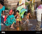 mothers washing her babies tungabhadra river hampi india ct963k.jpg from hindi mom aunty village washing clothes hot sexy vi