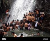 lot of people enjoying bathing in palaruvi waterfallsscene from palaruvi cx01pc.jpg from kerala bathing