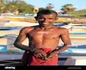 sri lankan fisherman on back bay beach in trincomalee sri lanka cxh2x7.jpg from skinny sri lankan