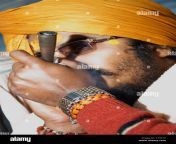 close up of a sadhu smoking a chilam haridwar uttarakhand india c19t1c.jpg from chur chilam chummi