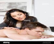 woman massaging man in bed c1xwa6.jpg from ladies massage for man