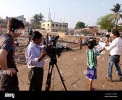 cinematographer operating a camera on a location film shoot in mumbai c2bnhn.jpg from mumbai on cam