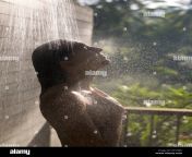 como shambhala estate bali indonesia woman in outdoor shower dct9rk.jpg from indonesian shower record