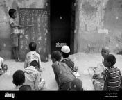 boy teaching hindi blackboard village school children uttar pradesh dh1jp0.jpg from village hindi scho
