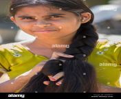 rural indian village girl plaiting her long hair andhra pradesh india d2xr7c.jpg from village chut hair