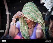 a shy indian woman is smiling under sharee e8c4m9.jpg from view full screen shy indian hiding her face giving blowjob to lover scandal mp4