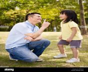 asian father and daughter having a conversation outdoors erga18.jpg from littile asian step dad vjav com