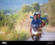 young woman riding pillion on moped with arms open on rural road majorca gxbxgp.jpg from indian riding pillion jeans pulled down ass crack visible voyeur mmsm teach sex to son 3gp