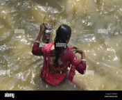 agartala india 26th mar 2017 traditional holi bath in india baruni hxd0kh.jpg from ganga lady snan holi river bath cute