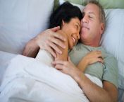 1140 happy mature couple laying in bed.jpg from woman sex aur nauk