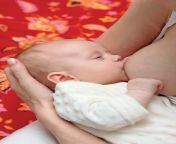 mother holding baby girl.jpg from women breast milk fe
