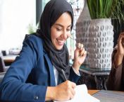 young business woman in office.jpg from muslim behijap