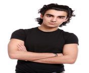 young latino man with arms crossed.jpg from guy latino